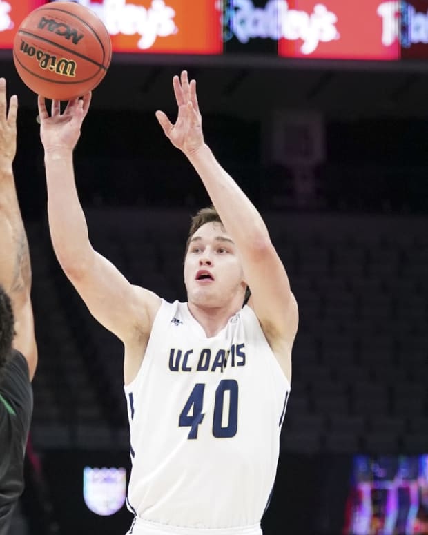 November 20, 2019; Sacramento, CA, USA; UC Davis Aggies guard Elijah Pepper (40) shoots the basketball against Sacramento State Hornets guard Brandon Davis (11) during the first half at Golden 1 Center. Mandatory Credit: Kyle Terada-USA TODAY Sports
